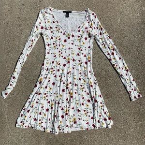 White floral dress with yellow and red flowers, flowy bottom